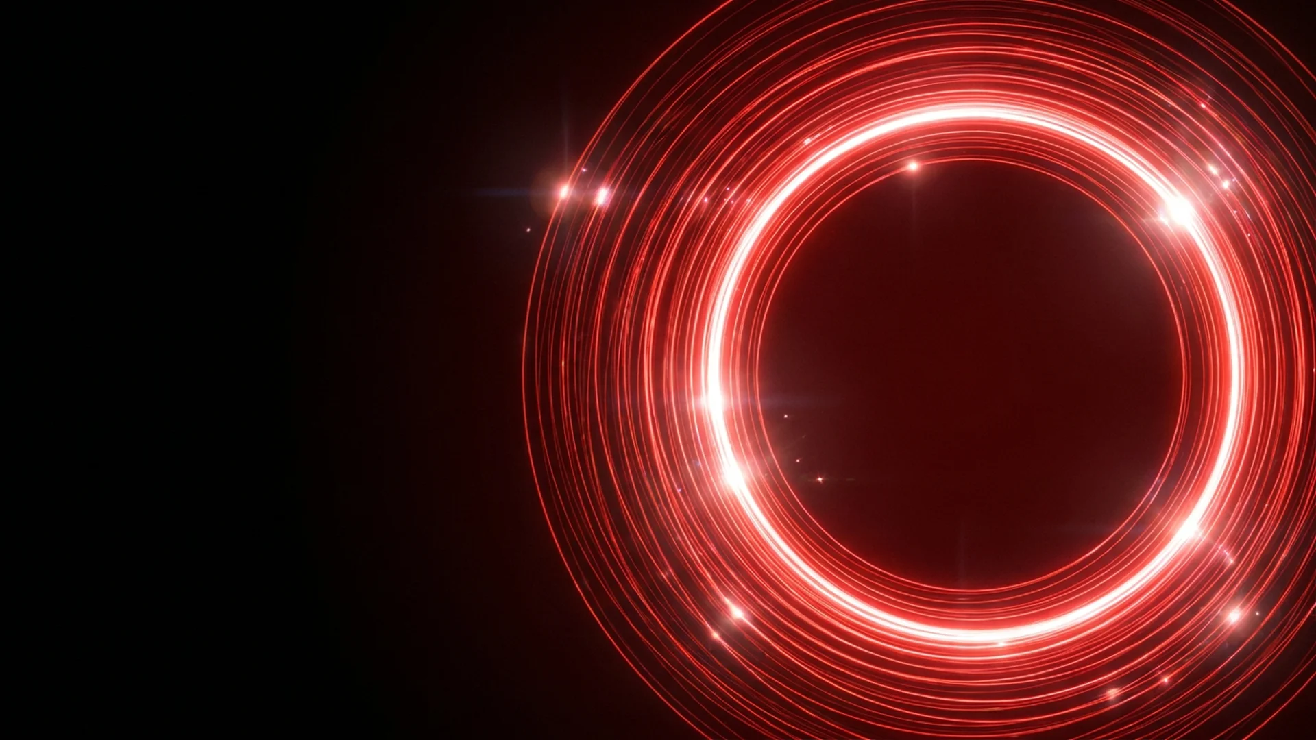 Red ring of light on a dark background